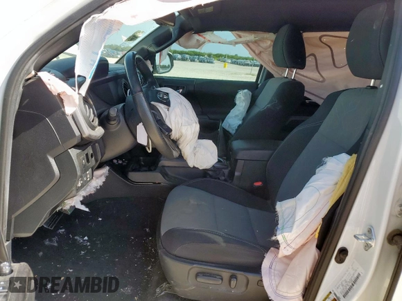 2021 Toyota Tacoma SR с VIN 5TFCZ5AN7MX268938, выставлен на аукционе Copart как лот 61241295 с пробегом 61 747 миль миль и Списание • Salvage title. История ставок и продаж доступна на DreamBid. Изображение 7.
