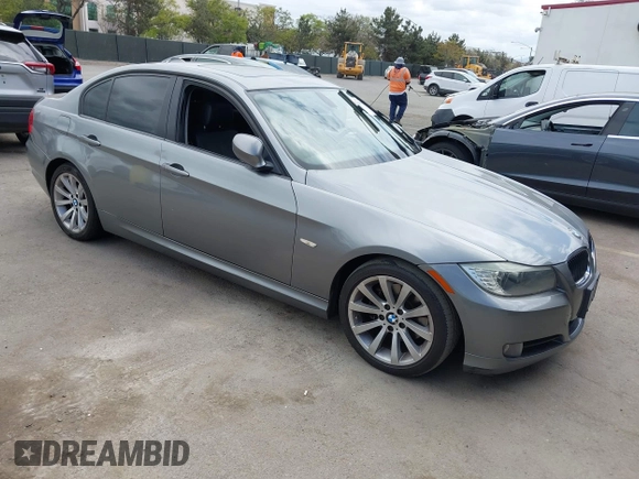 2011 BMW 3 Series 328i with VIN WBAPH5G52BNM84035, listed as a IAAI auction lot 42046301 with 165,418 mi miles. Bid and sale history available at carsss.com. Image 1.