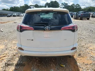 2016 Toyota RAV4 SE with VIN JTMNFREVXGD086661, listed as a Copart auction lot 58528965 with 70,523 mi miles and Salvage title. Bid and sale history available at DreamBid. Image 6.