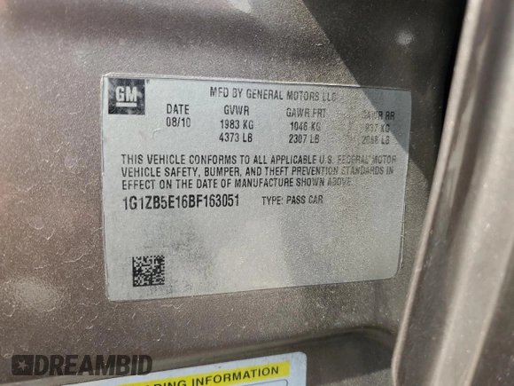 2011 Chevrolet Malibu 1LS with VIN 1G1ZB5E16BF163051, listed as a Copart auction lot 56042185 with 140,953 mi miles and Salvage Title. Bid and sale history available at DreamBid. Image 12.
