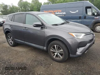 2018 Toyota RAV4 XLE with VIN 2T3WFREV0JW445322, listed as a Copart auction lot 55623845 with 116,700 mi miles and Salvage title. Bid and sale history available at DreamBid. Image 4.