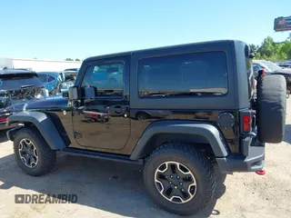2015 Jeep Wrangler Rubicon Hard Rock with VIN 1C4BJWCG1FL610028, listed as a IAAI auction lot 42318569 with 48,627 mi miles and . Bid and sale history available at DreamBid. Image 14.