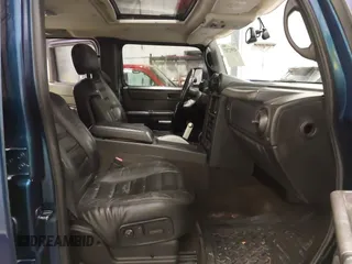 2006 Hummer H2 z VIN 5GRGN22U06H103603, wystawiony jako IAAI lot #41992767 z przebiegiem 165 782 mil mil oraz . Historia ofert i sprzedaży dostępna na DreamBid. Obrazek 5.