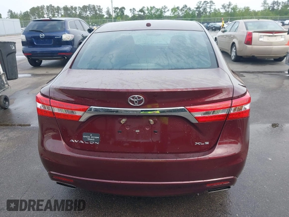 2014 Toyota Avalon Limited with VIN 4T1BK1EB3EU113035, listed as a IAAI auction lot 42040239 with 118,609 mi miles. Bid and sale history available at carsss.com. Image 15.
