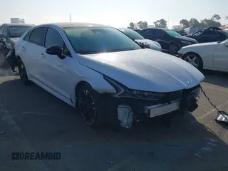 2022 Kia K5 GT-Line z VIN 5XXG64J26NG103451, wystawiony jako IAAI lot #41623464 z przebiegiem 40 641 mil mil oraz . Historia ofert i sprzedaży dostępna na DreamBid. Obrazek 1.