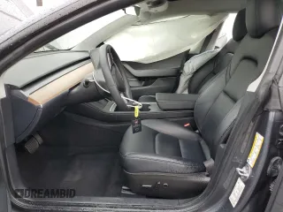 2023 Tesla Model 3 with VIN 5YJ3E1EA2PF708297, listed as a Copart auction lot 47982675 with 16,246 mi miles and Salvage title. Bid and sale history available at DreamBid. Image 7.
