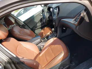 2013 Hyundai Santa Fe Sport z VIN 5XYZW3LA3DG068434, wystawiony jako IAAI lot #42167040 z przebiegiem 140 928 mil mil oraz . Historia ofert i sprzedaży dostępna na DreamBid. Obrazek 5.
