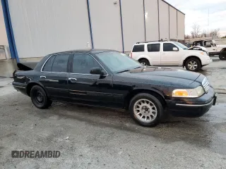 2000 Ford Crown Victoria LX z VIN 2FAFP74W3YX122481, wystawiony jako Copart lot #79189794 z przebiegiem 277 772 mil mil oraz Nie do naprawy • Non repairable. Historia ofert i sprzedaży dostępna na DreamBid. Obrazek 4.