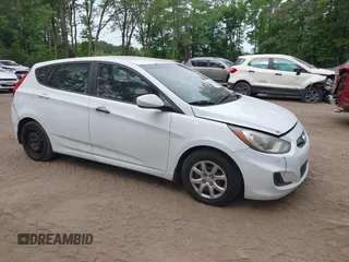 2014 Hyundai Accent GS with VIN KMHCT5AE7EU155474, listed as a IAAI auction lot 42441133 with 151,562 mi miles and . Bid and sale history available at DreamBid. Image 1.