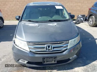 2011 Honda Odyssey Touring with VIN 5FNRL5H96BB009580, listed as a IAAI auction lot 42202595 with Not provided miles and . Bid and sale history available at DreamBid. Image 12.