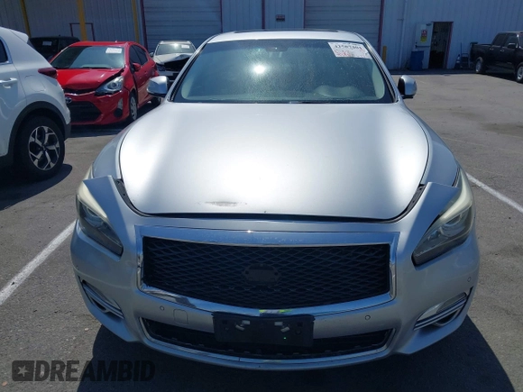 2015 Infiniti Q70 с VIN JN1BY1PP9FM600451, выставлен на аукционе IAAI как лот 42587404 с пробегом 165 071 миль миль и . История ставок и продаж доступна на DreamBid. Изображение 6.