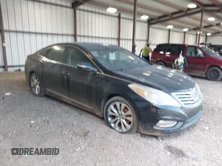2012 Hyundai Azera with VIN KMHFG4JG5CA138605, listed as a IAAI auction lot 42690936 with 148,801 mi miles and . Bid and sale history available at DreamBid. Image 1.