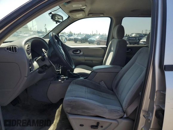 2006 Chevrolet TrailBlazer LS with VIN 1GNET16SX66161738, listed as a Copart auction lot 52436865 with 194,452 mi miles and Salvage Title. Bid and sale history available at DreamBid. Image 7.