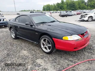 1996 Ford Mustang GT z VIN 1FALP42X8TF152688, wystawiony jako IAAI lot #42217077 z przebiegiem 147 201 mil mil oraz . Historia ofert i sprzedaży dostępna na DreamBid. Obrazek 1.