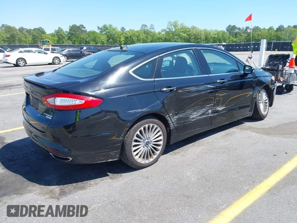 2016 Ford Fusion Titanium with VIN 3FA6P0K9XGR158234, listed as a IAAI auction lot 42043716 with 161,164 mi miles. Bid and sale history available at carsss.com. Image 4.