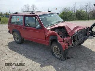 1992 Jeep Cherokee z VIN 1J4FJ27S0NL216957, wystawiony jako Copart lot #52689055 z przebiegiem 226 581 mil mil oraz Szkoda całkowita • Salvage title. Historia ofert i sprzedaży dostępna na DreamBid. Obrazek 4.