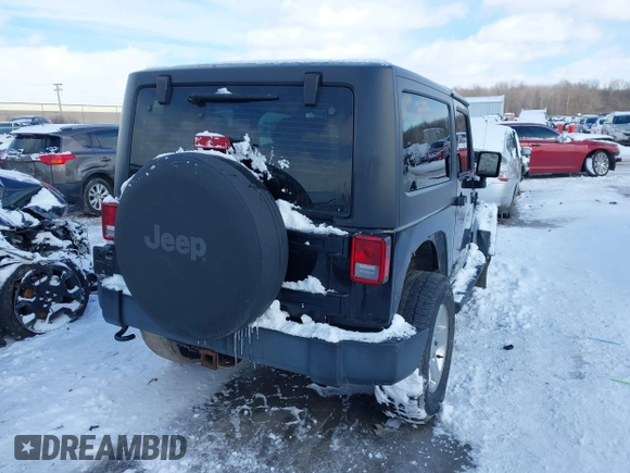 2014 Jeep Wrangler Sport with VIN 1C4AJWAG5EL285994, listed as a IAAI auction lot 41558673 with 98,779 mi miles and . Bid and sale history available at DreamBid. Image 4.