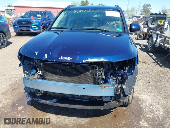 2014 Jeep Compass Latitude with VIN 1C4NJCEB2ED883243, listed as a IAAI auction lot 41989007 with 138,192 mi miles. Bid and sale history available at carsss.com. Image 13.