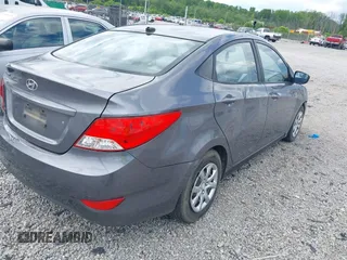 2014 Hyundai Accent GLS with VIN KMHCT4AE6EU670895, listed as a IAAI auction lot 42197066 with 142,983 mi miles and . Bid and sale history available at carsss.com. Image 4.