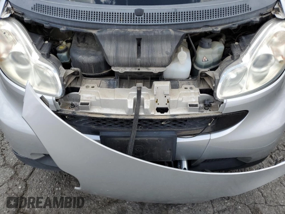2009 Smart fortwo Pure with VIN WMEEJ31X89K251402, listed as a Copart auction lot 56791545 with 52,636 mi miles and Clean title. Bid and sale history available at DreamBid. Image 11.