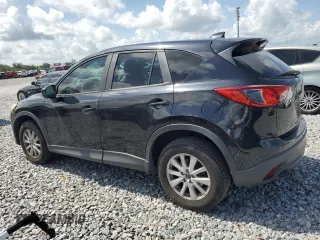 2014 Mazda CX-5 Touring z VIN JM3KE2CY8E0326988, wystawiony jako Copart lot #60473715 z przebiegiem 231 055 mil mil oraz Czysty tytuł • Clean title. Historia ofert i sprzedaży dostępna na DreamBid. Obrazek 2.