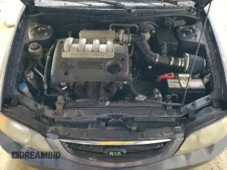 2003 Kia Spectra GS z VIN KNAFB161135104592, wystawiony jako Copart lot #52097205 z przebiegiem 119 206 mil mil oraz Szkoda całkowita • Salvage title. Historia ofert i sprzedaży dostępna na DreamBid. Obrazek 11.