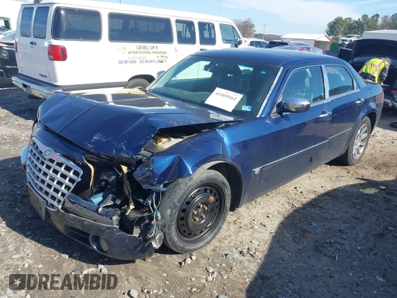2005 Chrysler 300 with VIN 2C3JA63HX5H654114, listed as a IAAI auction lot 41469161 with 136,104 mi miles. Bid and sale history available at carsss.com. Image 18.