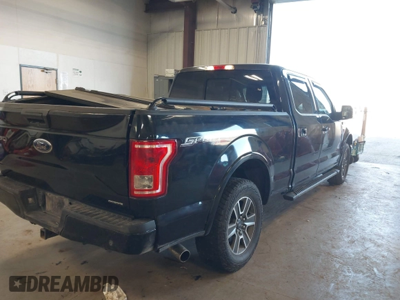 2015 Ford F-150 XLT with VIN 1FTFW1EF3FKD51350, listed as a IAAI auction lot 41413942 with 125,877 mi miles and . Bid and sale history available at carsss.com. Image 4.