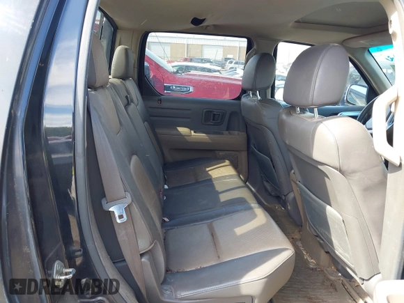 2006 Honda Ridgeline RTL with VIN 2HJYK165X6H538680, listed as a IAAI auction lot 42629916 with 145,620 mi miles and . Bid and sale history available at DreamBid. Image 8.