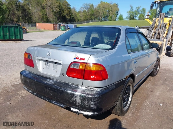 1999 Honda Civic VP with VIN 2HGEJ6616XH537100, listed as a IAAI auction lot 42018708 with 229,594 mi miles. Bid and sale history available at carsss.com. Image 4.