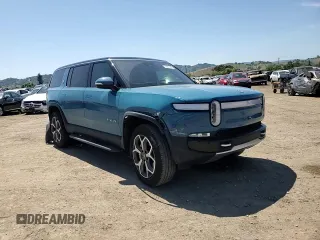 2024 Rivian R1S Adventure z VIN 7PDSGBBA0RN034793, wystawiony jako Copart lot #55091885 z przebiegiem 20 154 mil mil oraz Szkody całkowita. Historia ofert i sprzedaży dostępna na DreamBid. Obrazek 14.