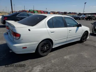 2002 Infiniti G20 Luxury z VIN JNKCP11A52T509667, wystawiony jako Copart lot #72986584 z przebiegiem 119 458 mil mil oraz Szkody całkowita. Historia ofert i sprzedaży dostępna na DreamBid. Obrazek 3.