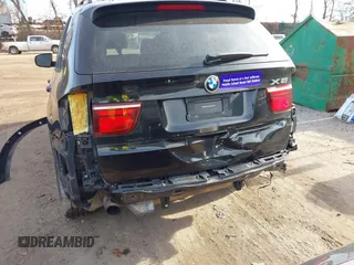 2011 BMW X5 35i z VIN 5UXZV4C52BL739488, wystawiony jako IAAI lot #41199011 z przebiegiem 193 403 mil mil oraz . Historia ofert i sprzedaży dostępna na DreamBid. Obrazek 6.