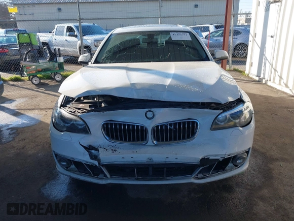 2015 BMW 5 Series 528i with VIN WBA5A5C5XFD520132, listed as a IAAI auction lot 41433751 with 76,576 mi miles and . Bid and sale history available at DreamBid. Image 12.