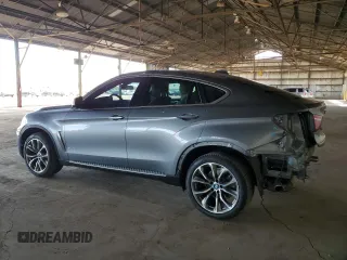 2015 BMW X6 xDrive35i with VIN 5UXKU2C59F0N77312, listed as a Copart auction lot 63591123 with 121,105 mi miles. Bid and sale history available at carsss.com. Image 2.