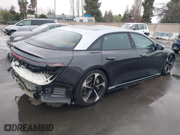 2023 Lucid Air Grand Touring z VIN 50EA1GBA3PA001806, wystawiony jako IAAI lot #41713303 z przebiegiem 6367 mil mil oraz . Historia ofert i sprzedaży dostępna na DreamBid. Obrazek 4.
