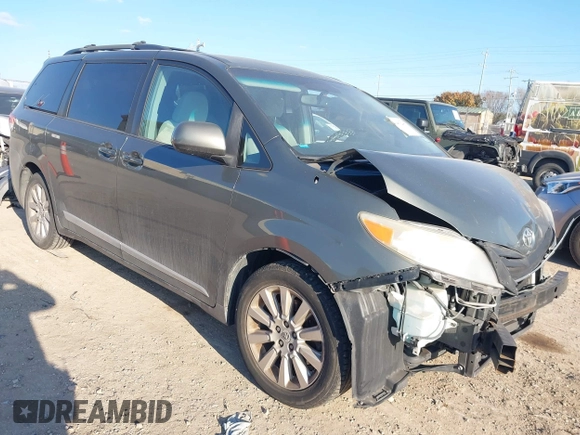 2012 Toyota Sienna LE with VIN 5TDJK3DCXCS039801, listed as a IAAI auction lot 41483248 with 165,548 mi miles. Bid and sale history available at carsss.com. Image 1.