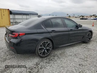 2021 BMW 5 Series 530e with VIN WBA13AG00MCF09677, listed as a Copart auction lot 54907205 with 50,033 mi miles and Salvage title. Bid and sale history available at DreamBid. Image 3.