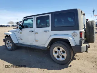 2014 Jeep Wrangler Unlimited Sahara with VIN 1C4BJWEG5EL111115, listed as a Copart auction lot 48385295 with 140,652 mi miles and Salvage Title. Bid and sale history available at carsss.com. Image 2.