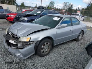 1999 Acura TL with VIN 19UUA5657XA021688, listed as a IAAI auction lot 41997466 with 241,232 mi miles. Bid and sale history available at carsss.com. Image 14.