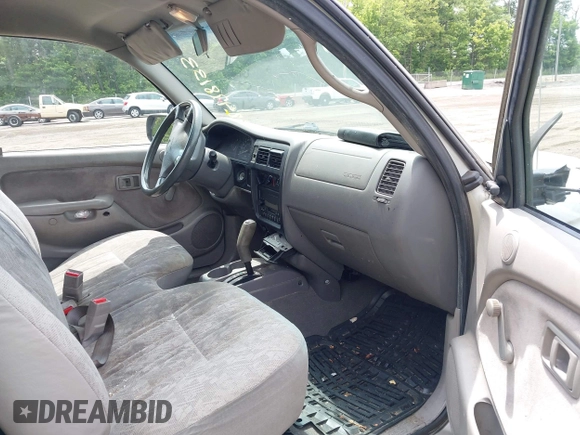 2001 Toyota Tacoma z VIN 5TENL42N31Z873658, wystawiony jako IAAI lot #42476133 z przebiegiem 261 394 mil mil oraz . Historia ofert i sprzedaży dostępna na DreamBid. Obrazek 5.