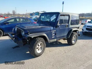 1997 Jeep Wrangler Sport with VIN 1J4FY19S1VP462136, listed as a IAAI auction lot 41766868 with 130,980 mi miles. Bid and sale history available at carsss.com. Image 2.