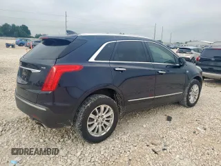 2017 Cadillac XT5 FWD with VIN 1GYKNARS8HZ162612, listed as a Copart auction lot 58727265 with 100,494 mi miles and Clean title. Bid and sale history available at DreamBid. Image 3.