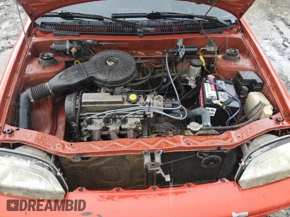 1990 Geo Metro z VIN JG1MR2462LK718930, wystawiony jako Copart lot #57726315 z przebiegiem 72 234 mil mil oraz Tytuł czysty. Historia ofert i sprzedaży dostępna na DreamBid. Obrazek 11.