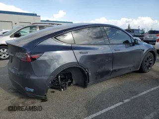 2021 Tesla Model Y Long Range with VIN 5YJYGDEE6MF200883, listed as a Copart auction lot 51707405 with 59,820 mi miles and Salvage Title. Bid and sale history available at DreamBid. Image 3.