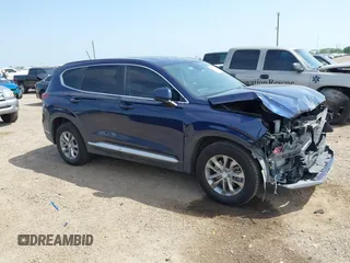 2019 Hyundai Santa Fe SE z VIN 5NMS23AD7KH003101, wystawiony jako IAAI lot #41944681 z przebiegiem 93 868 mil mil oraz . Historia ofert i sprzedaży dostępna na DreamBid. Obrazek 1.