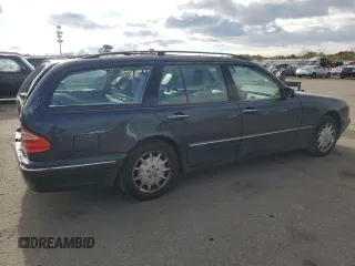 2001 Mercedes-Benz E-Class AWD with VIN WDBJH82J81X052002, listed as a Copart auction lot 82832724 with 187,464 mi miles and Salvage Title. Bid and sale history available at carsss.com. Image 3.