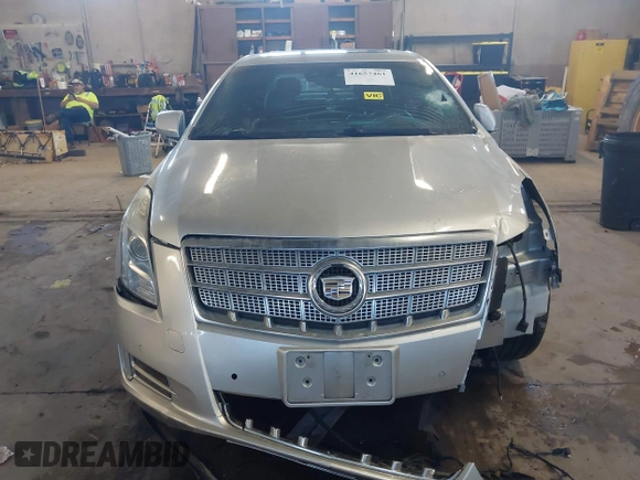 2013 Cadillac XTS Platinum with VIN 2G61V5S31D9190738, listed as a IAAI auction lot 41657461 with 136,924 mi miles and . Bid and sale history available at carsss.com. Image 13.