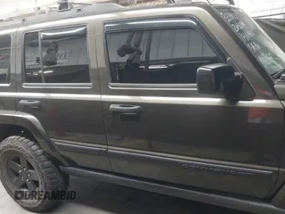 2006 Jeep Commander with VIN 1J8HG48KX6C263348, listed as a IAAI auction lot 42128039 with 208,605 mi miles and . Bid and sale history available at DreamBid. Image 14.