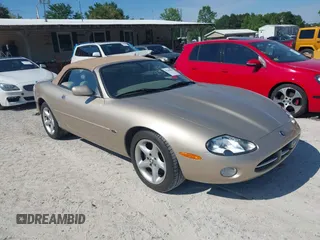 2002 Jaguar XK with VIN SAJDA42C32NA24378, listed as a IAAI auction lot 42205854 with 92,612 mi miles and . Bid and sale history available at DreamBid. Image 1.